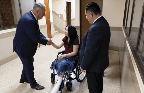 Flavia Cruzado with Elder Ulisses Soares.