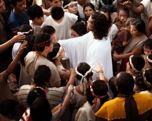 Film still from the Bible video project.  Christ surrounded by a crowd of people.  Photographed by Mark Mabry.