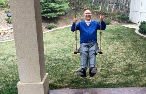 Russell M. Nelson on a swing