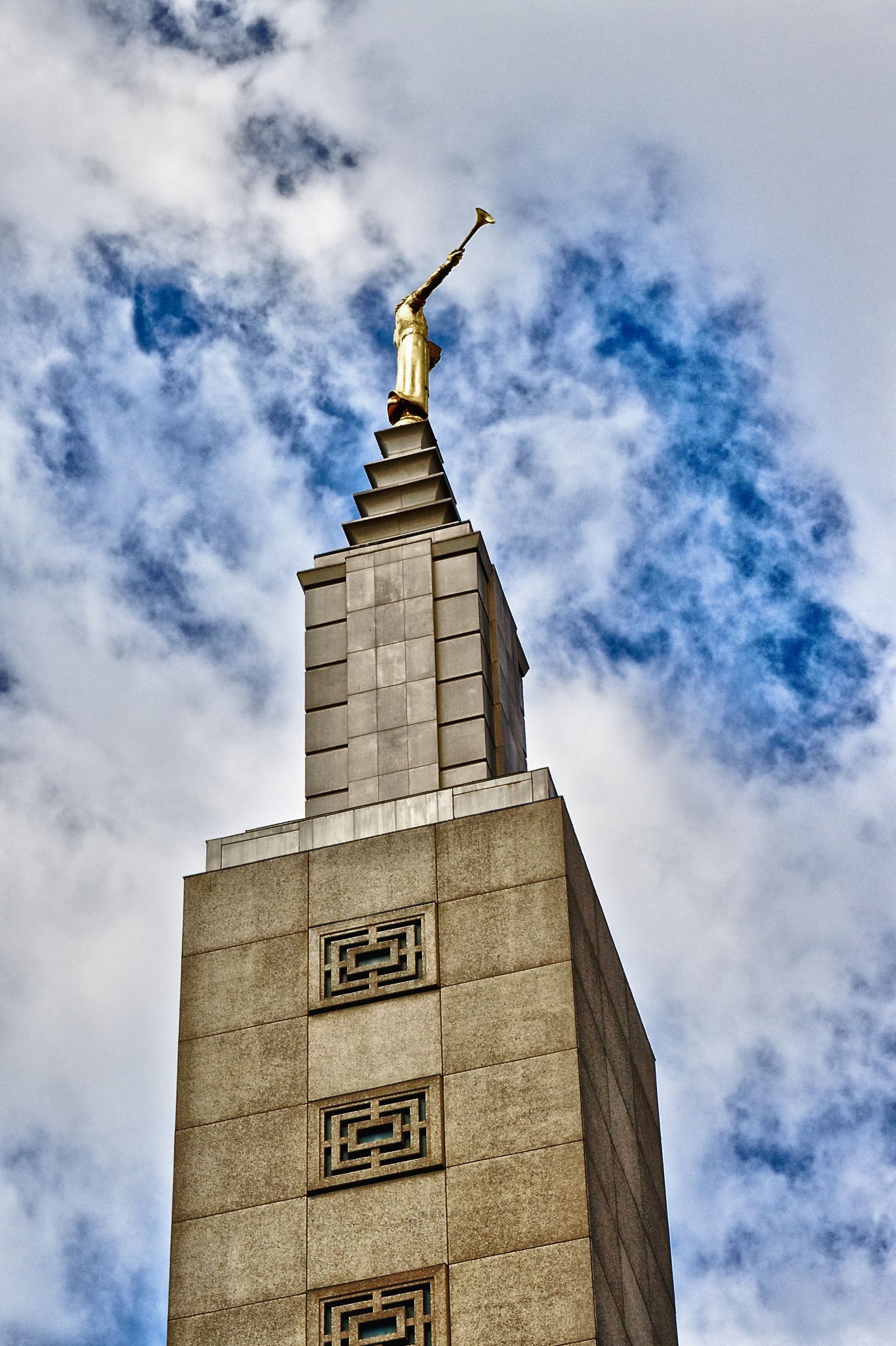 The Los Angeles California Temple spire, including the angel Moroni and the exterior of the temple.