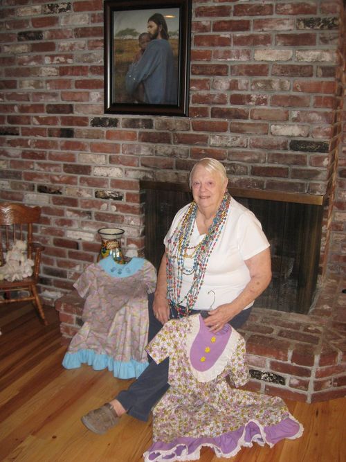 elderly woman and dresses she sewed