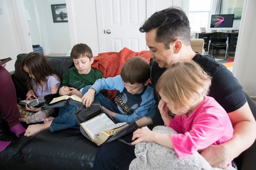 family reading scriptures