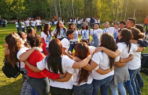 youth standing in a circle