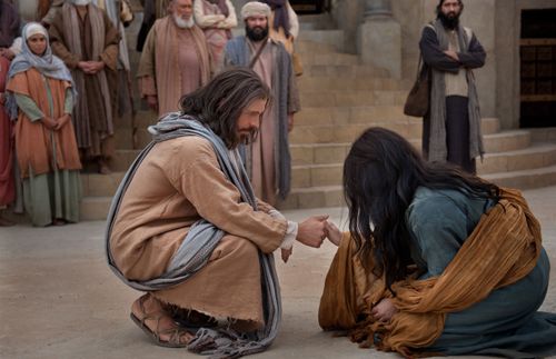 耶稣拉着行淫时被捉妇人的手