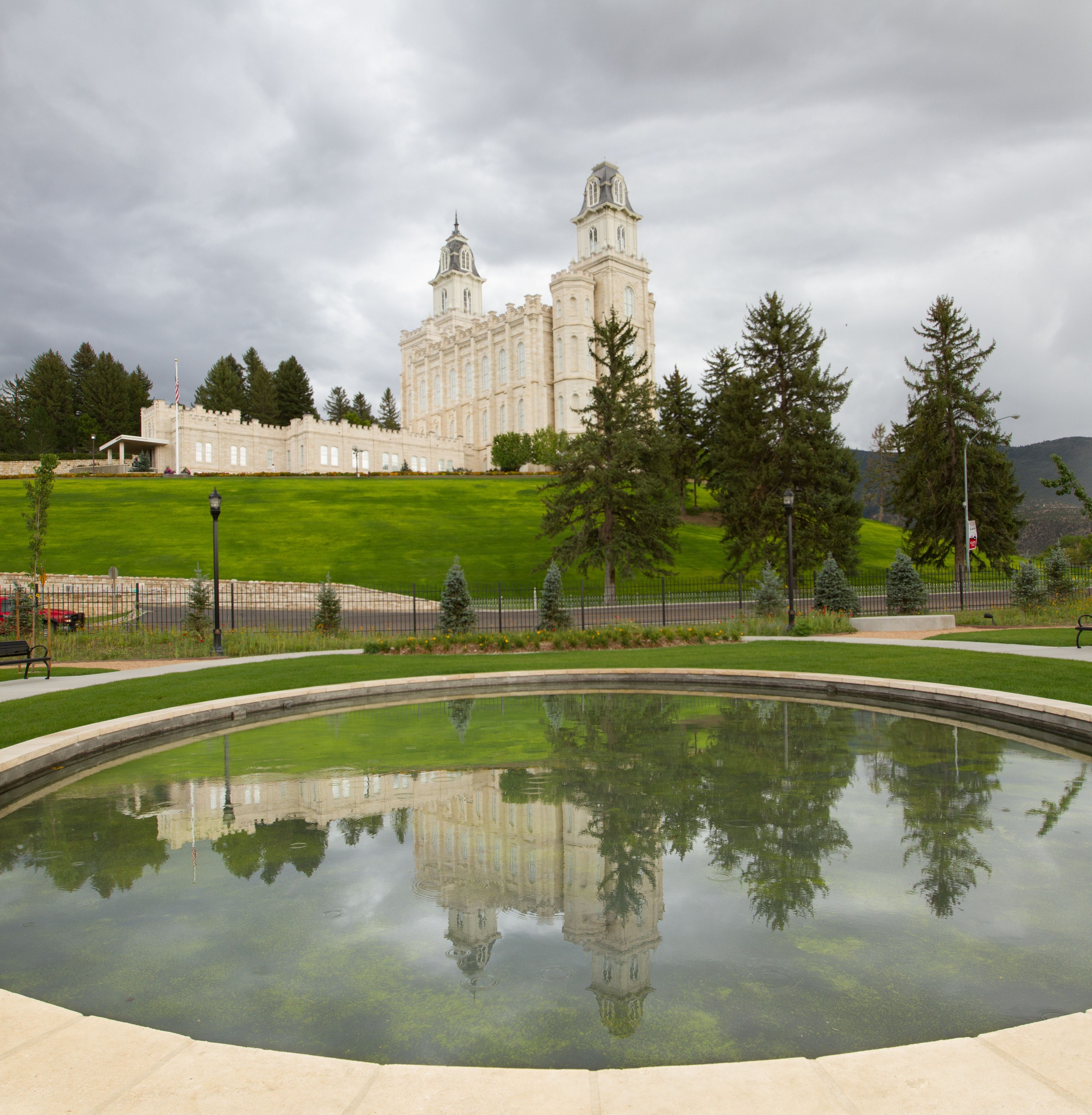 The Manti Utah Temple pond, including the scenery and entrance.