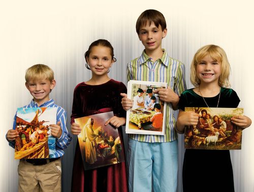 children holding pictures