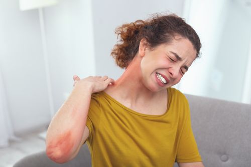 Woman with sore neck