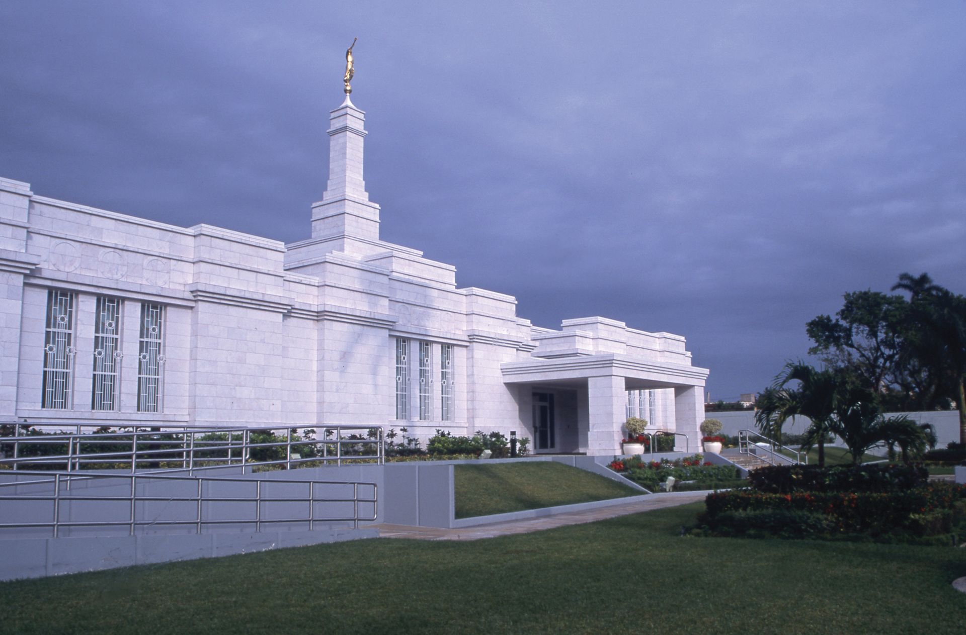 The Mérida Mexico Temple side view, including the entrance and scenery.