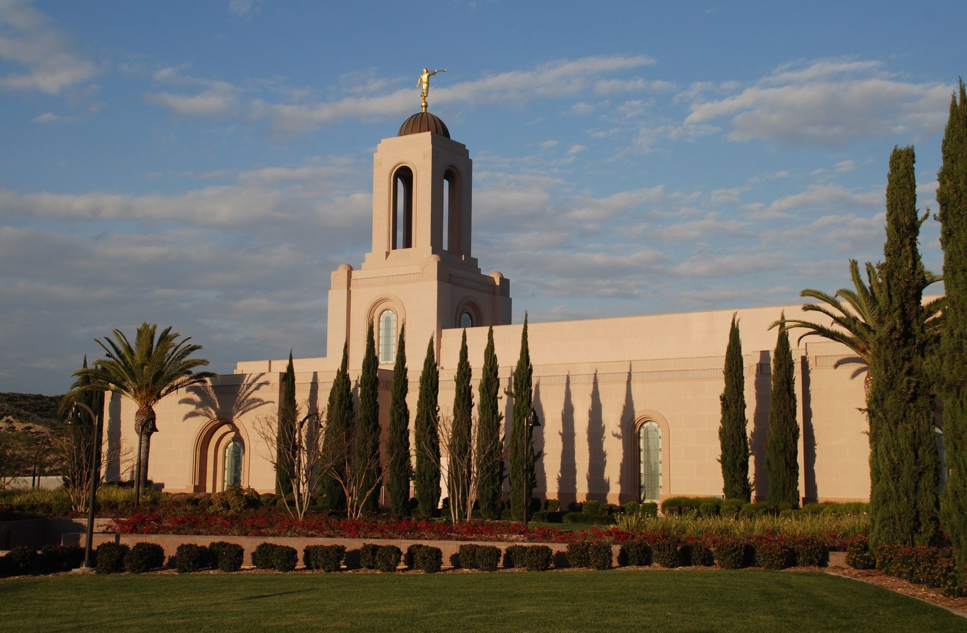 The Newport Beach California Temple at sunset, including scenery.