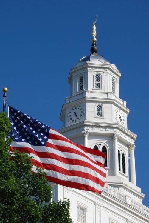 Nauvoo Illinois Temple with the United States flag flying in the foreground