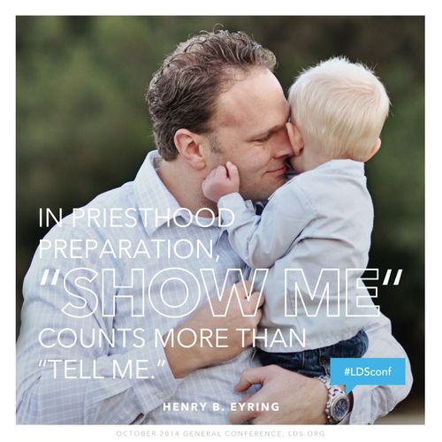 An image of a father holding his son, paired with a quote by President Henry B. Eyring: “‘Show me’ counts more than ‘tell me.’”