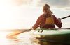 young adult woman in kayak