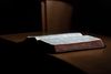 scriptures lying open on table
