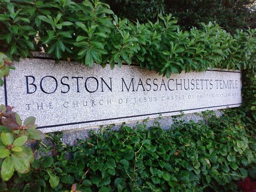 The granite sign outside of the Boston Massachusetts Temple that says, “Boston Massachusetts Temple: The Church of Jesus Christ of Latter-day Saints.”