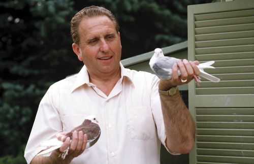 Thomas S. Monson with pigeons