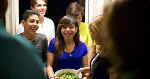 Youth preparing food for service project in Puerto Rico