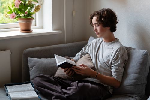 young man reading scriptures