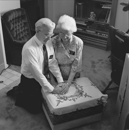 missionary couple praying together