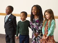 four chldren singing