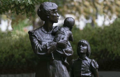 sculpture of mother and two children on Temple Square