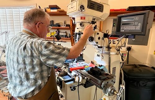 man at workbench