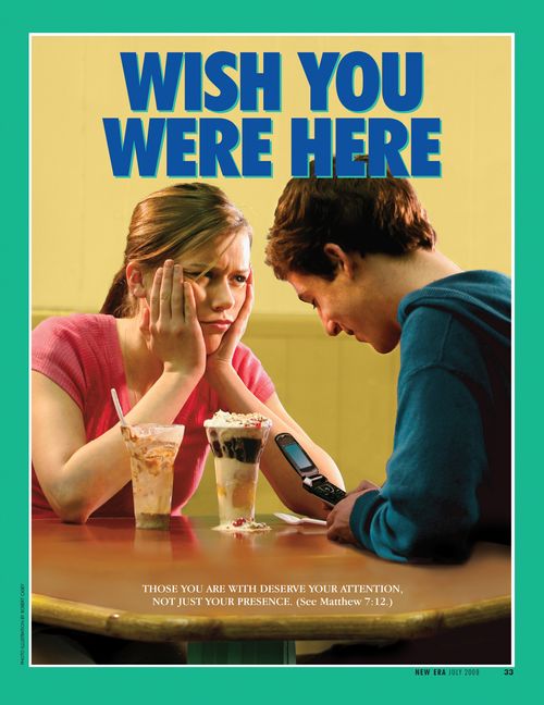 A conceptual photograph of a young woman glaring while her date looks down at his phone, paired with the words “Wish You Were Here.”
