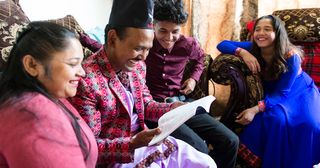 family reading the scriptures