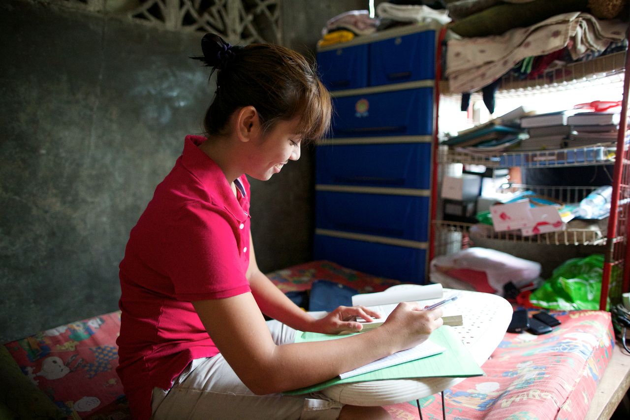 A woman reading the Book of Mormon