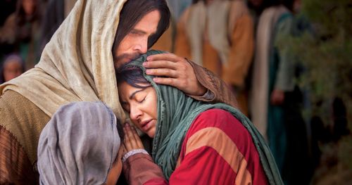 Depiction of Jesus embracing Mary and Martha.