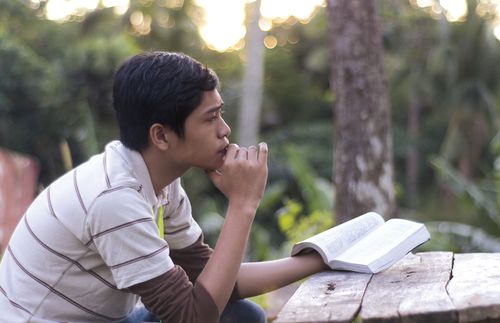 young man with scriptures
