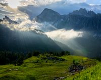 mountains, clouds, and sunlight