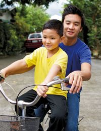 brothers on bicycle