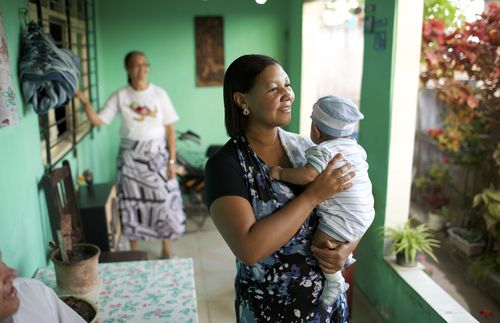 woman holding baby