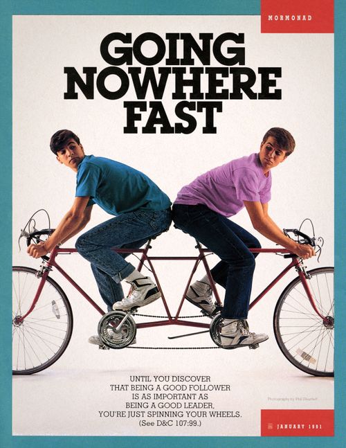 A photograph of two young men riding a tandem bike with two front handle bars facing opposite directions, paired with the words “Going Nowhere Fast.”