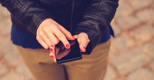 young person with phone