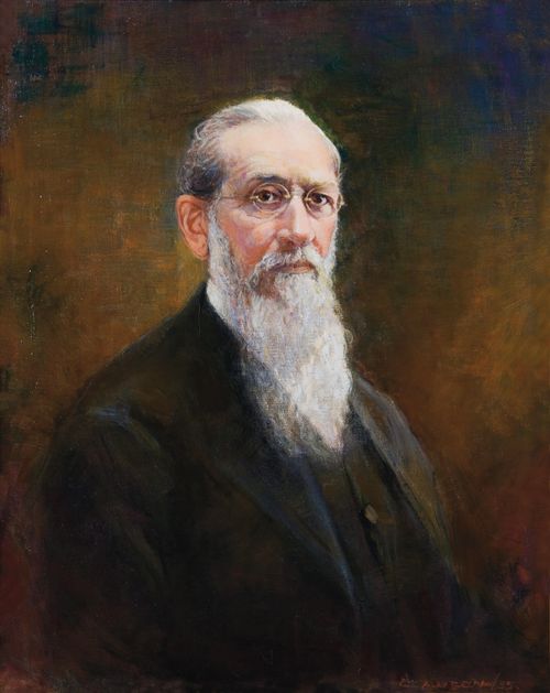 A painted portrait by John Willard Clawson of Joseph F. Smith in a dark suit with a long beard and round glasses.