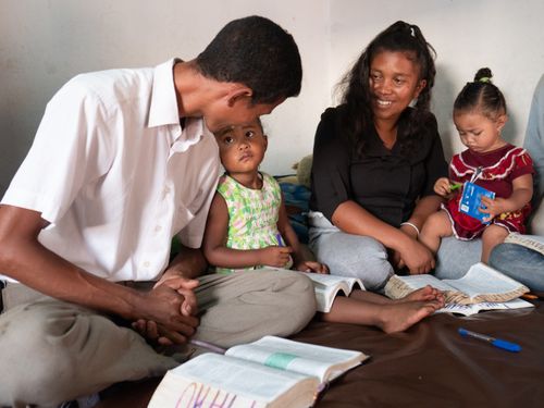 family studying scriptures