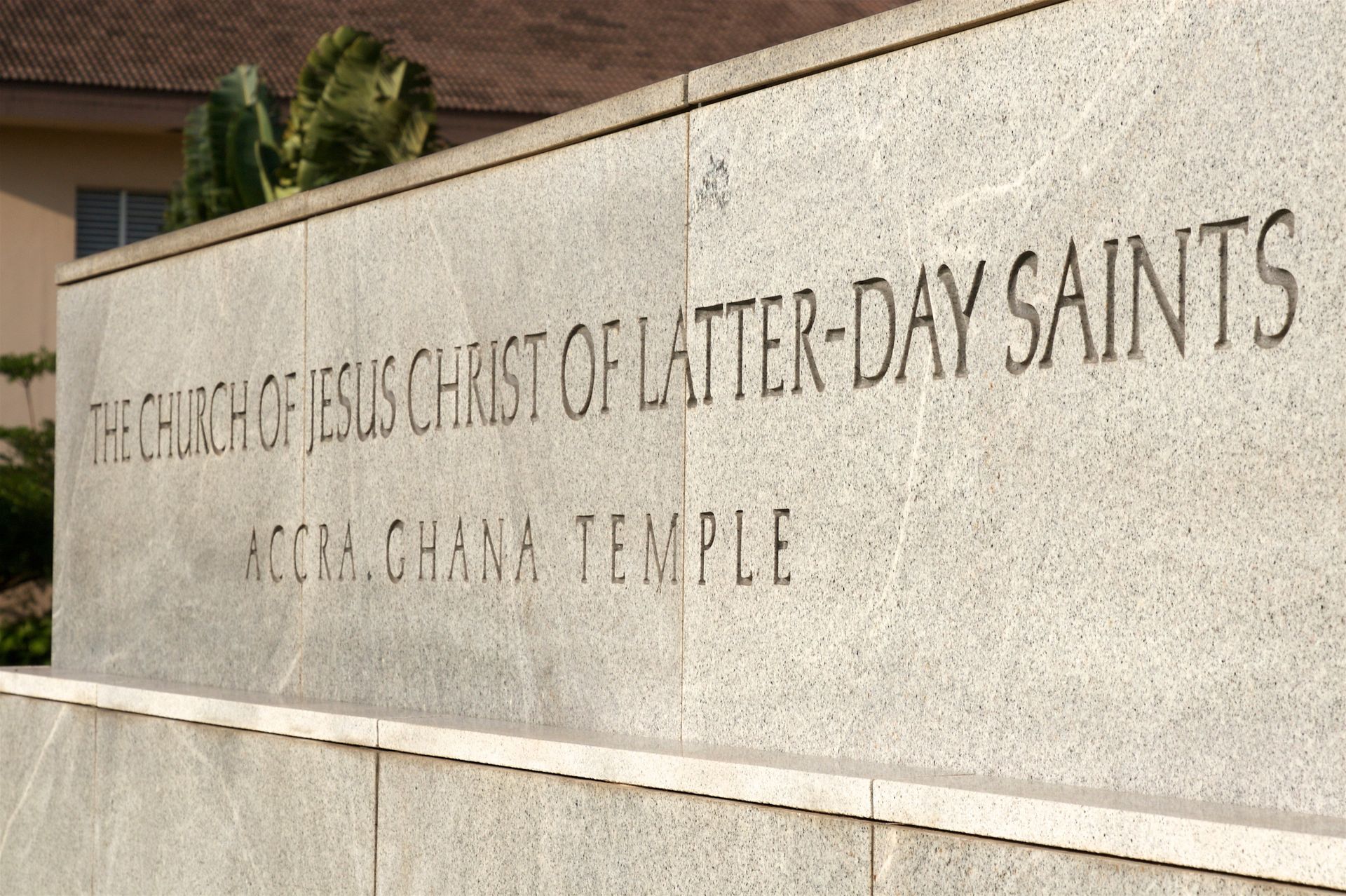 The temple name sign greets members as they come to the Accra Ghana Temple.