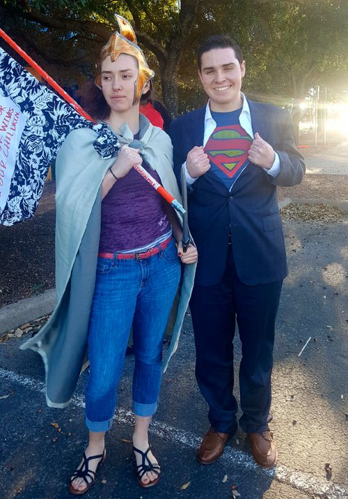 young woman and young man in costume