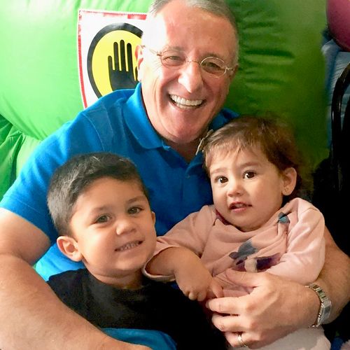 Elder Soares with two grandchildren