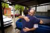father in Uruguay hugs his son