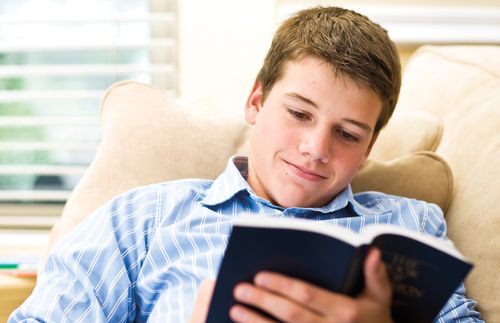 young man reading scriptures