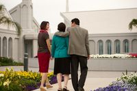 family walking near temple