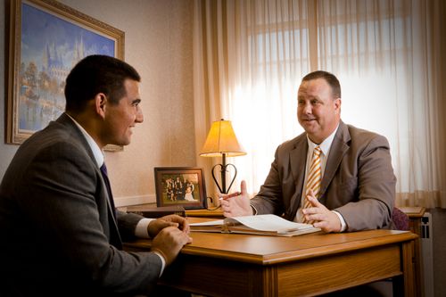 man in priesthood leader’s office