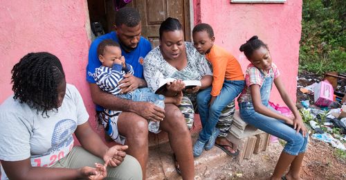 family reading scriptures