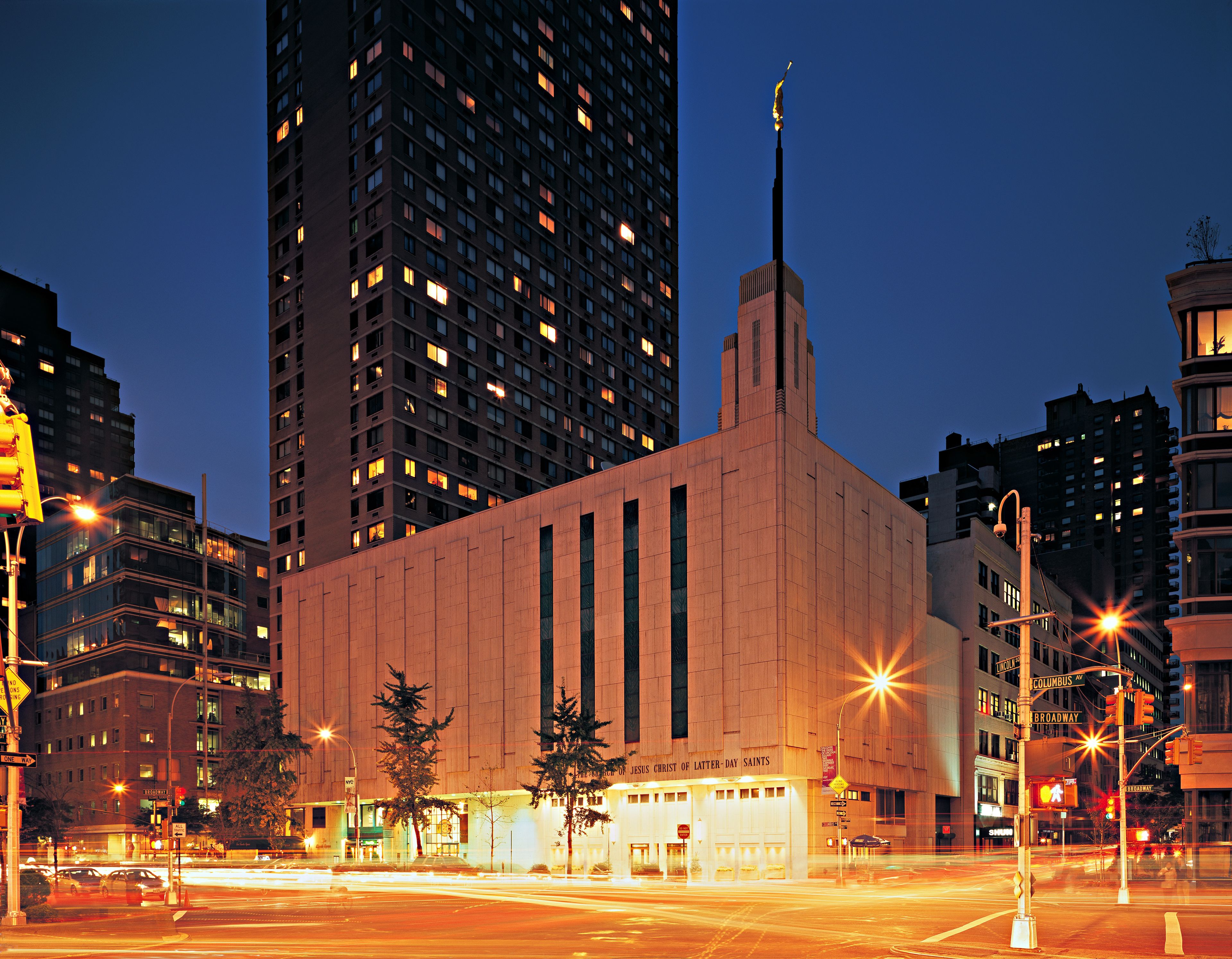 The Manhattan New York Temple in the evening, including the entrance.