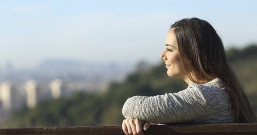 Woman pondering with a view.