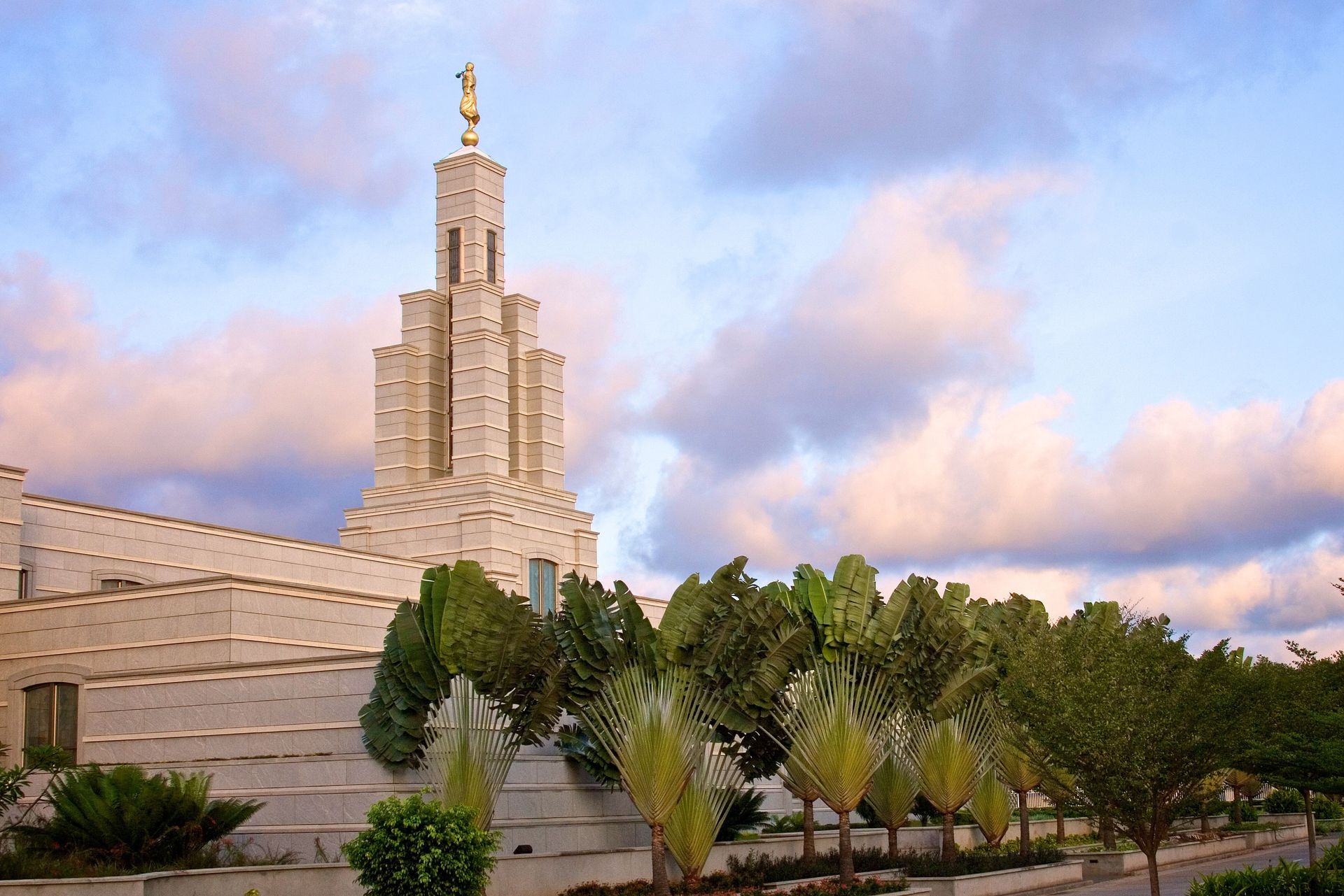 An exterior view of the Accra Ghana Temple during early evening.