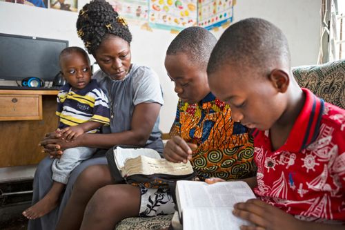 family reading the scriptures