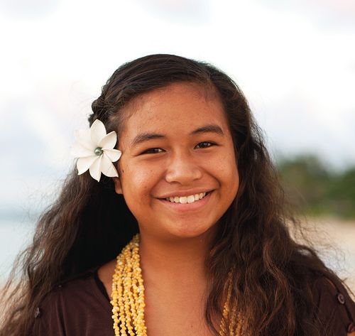 girl smiling on beach